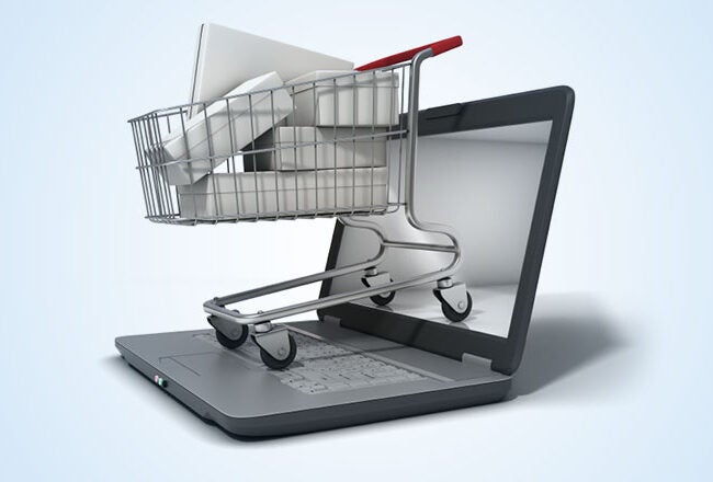 A shopping cart emerging from a laptop screen, symbolizing online shopping or e-commerce.