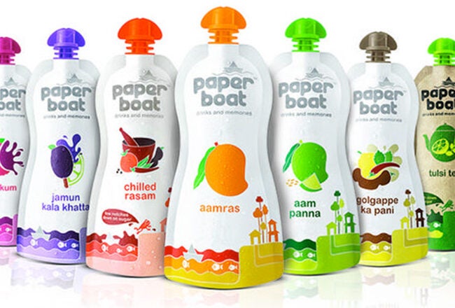 Assorted Paper Boat beverage pouches in various flavors, including jaljeera, kokum, jamun kala khatta, chilled rasam, aamras, aam panna, and others.