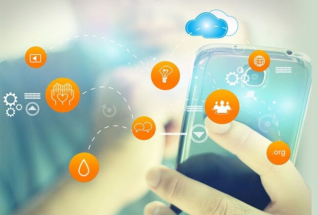 A person using a smartphone with digital icons representing cloud technology, communication, and various technological concepts floating around.