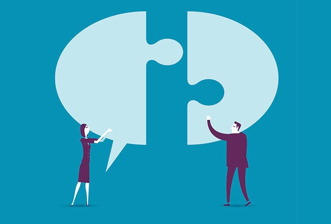 Two abstract human figures are each holding a piece of a puzzle, shaped like speech bubbles, symbolizing communication or collaboration.