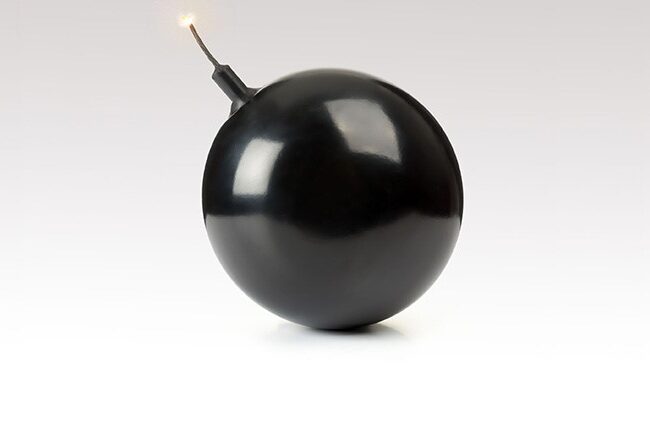 A black cartoon-style bomb with a lit fuse against a neutral background.
