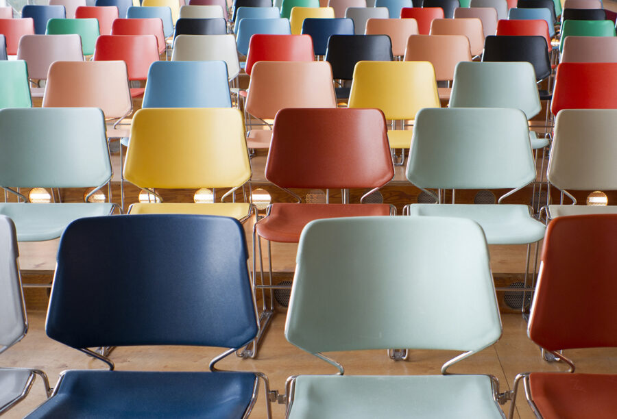 Colorful chairs symbolizing affirmative action