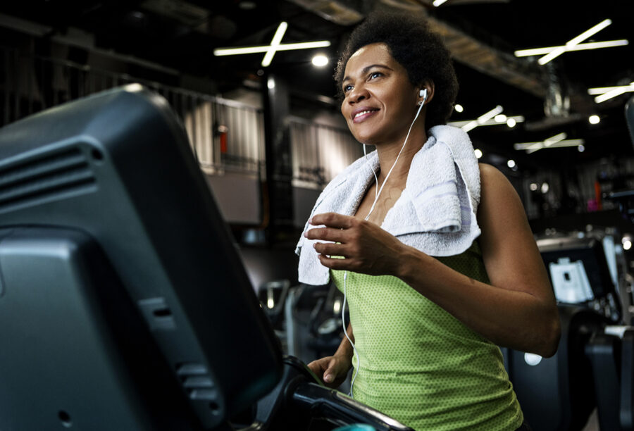 Woman forming a healthy habit by exercising at the gym