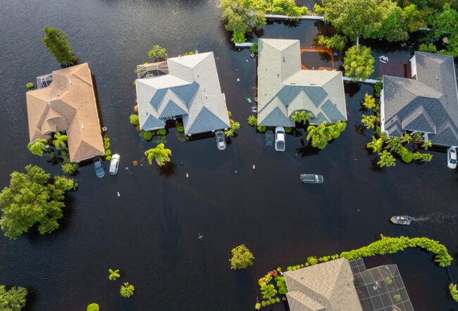 Aerial view of flooded homes and cars in Laurel Meadows community in Sarasota, Florida due to Hurricane Debby