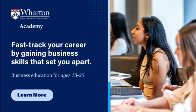 A small group of young adults in a classroom setting, with one person in focus, attentively listening. The image promotes Wharton Academy's business education program for individuals aged 18-25, encouraging career advancement. Click to learn more.