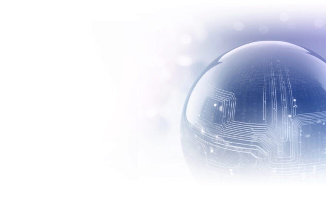 A transparent sphere with intricate circuitry patterns inside, symbolizing technology and connectivity, set against a light, blurred background.