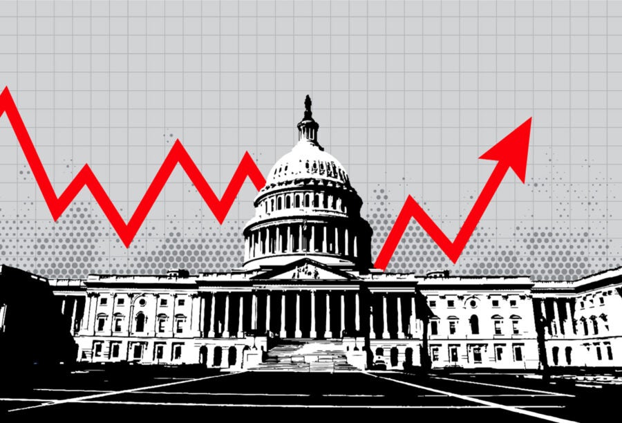 Illustration of the Capitol Building in Washington, D.C. in black and white with a red arrow going up and down behind it to show the state of the U.S. economy