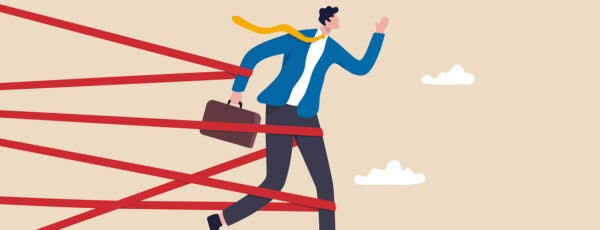 An illustration of a person in business attire running while entangled in red tape, symbolizing bureaucratic obstacles or restrictions.