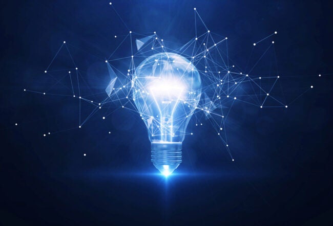 Glowing lightbulb with constellations around it to signify creativity and new ideas