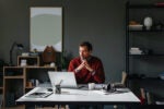 Man working in a home office as a freelancer.