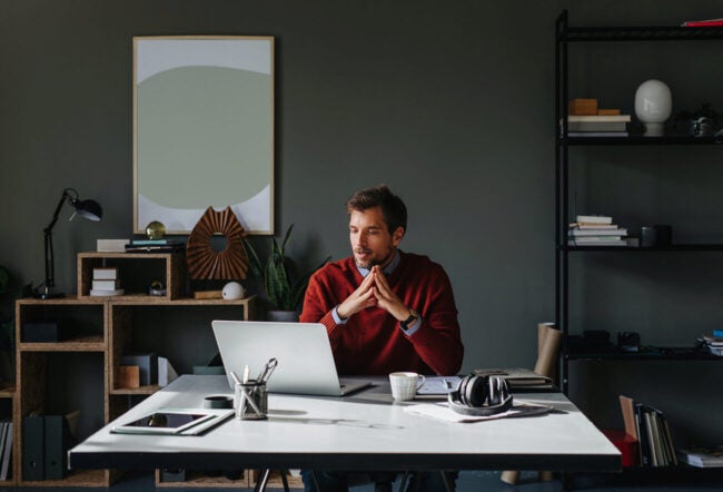 Man working in a home office as a freelancer.