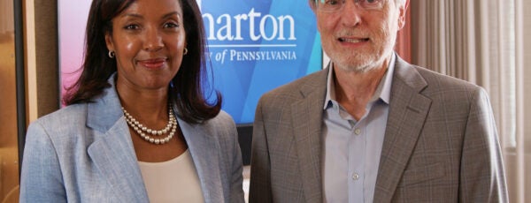 Erika James and Peter Cappelli standing side by side