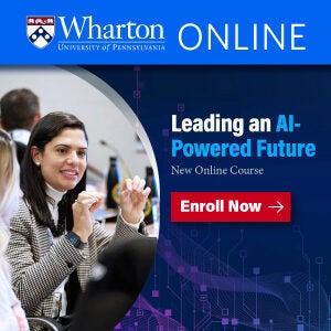 Advertisement for a Wharton Online course titled "Leading an AI-Powered Future." Features a smiling person gesturing with others nearby and a red "Enroll Now" button.