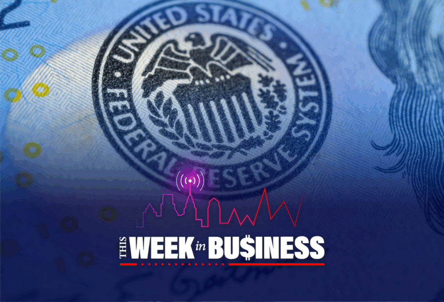 The image features the seal of the United States Federal Reserve System on currency, overlaid with the text "This Week in Business" and a city skyline outline with a rising graph.