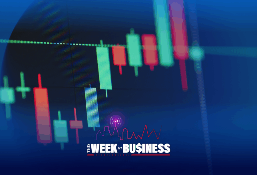 Stock market candlestick chart with red and green bars, overlaid with the text "This Week in Business" and a city skyline graphic.