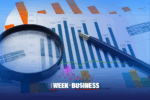 Charts and graphs with a pen and magnifying glass, representing business analysis or financial review. The text 